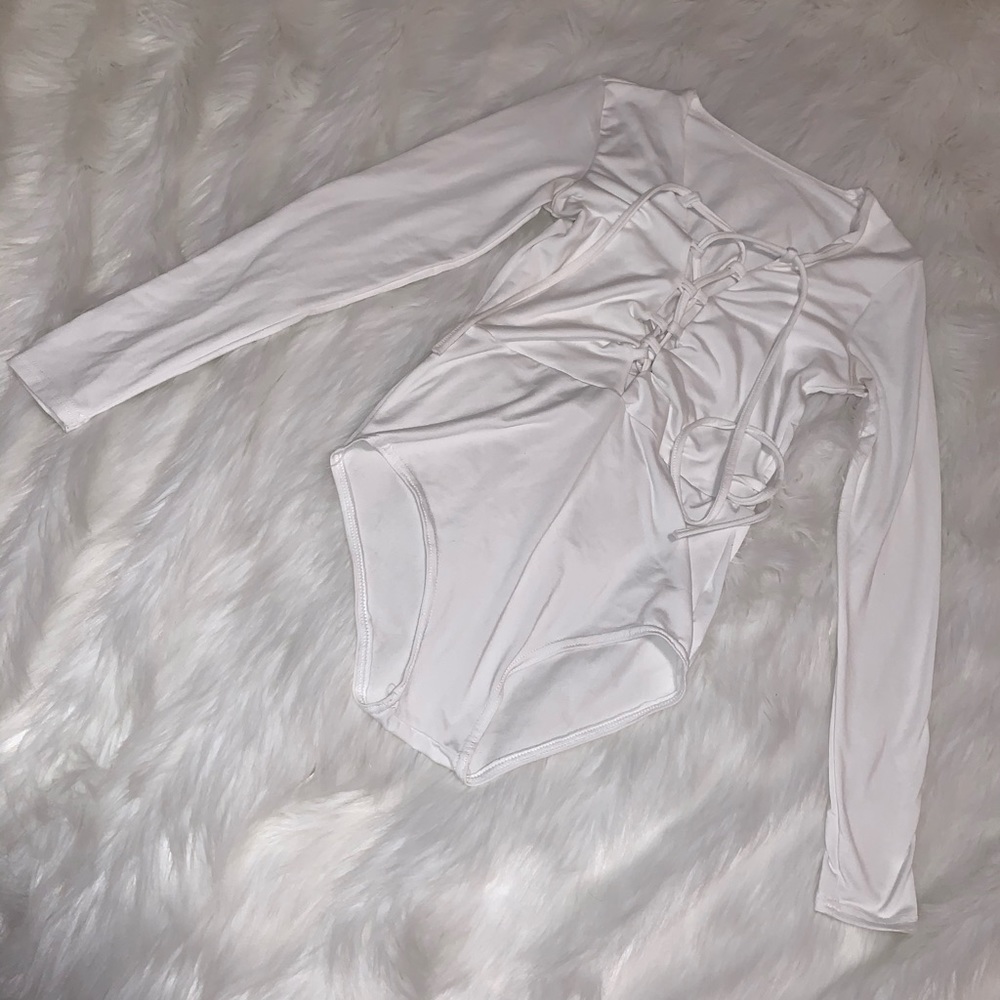 White lace up long sleeve bodysuit